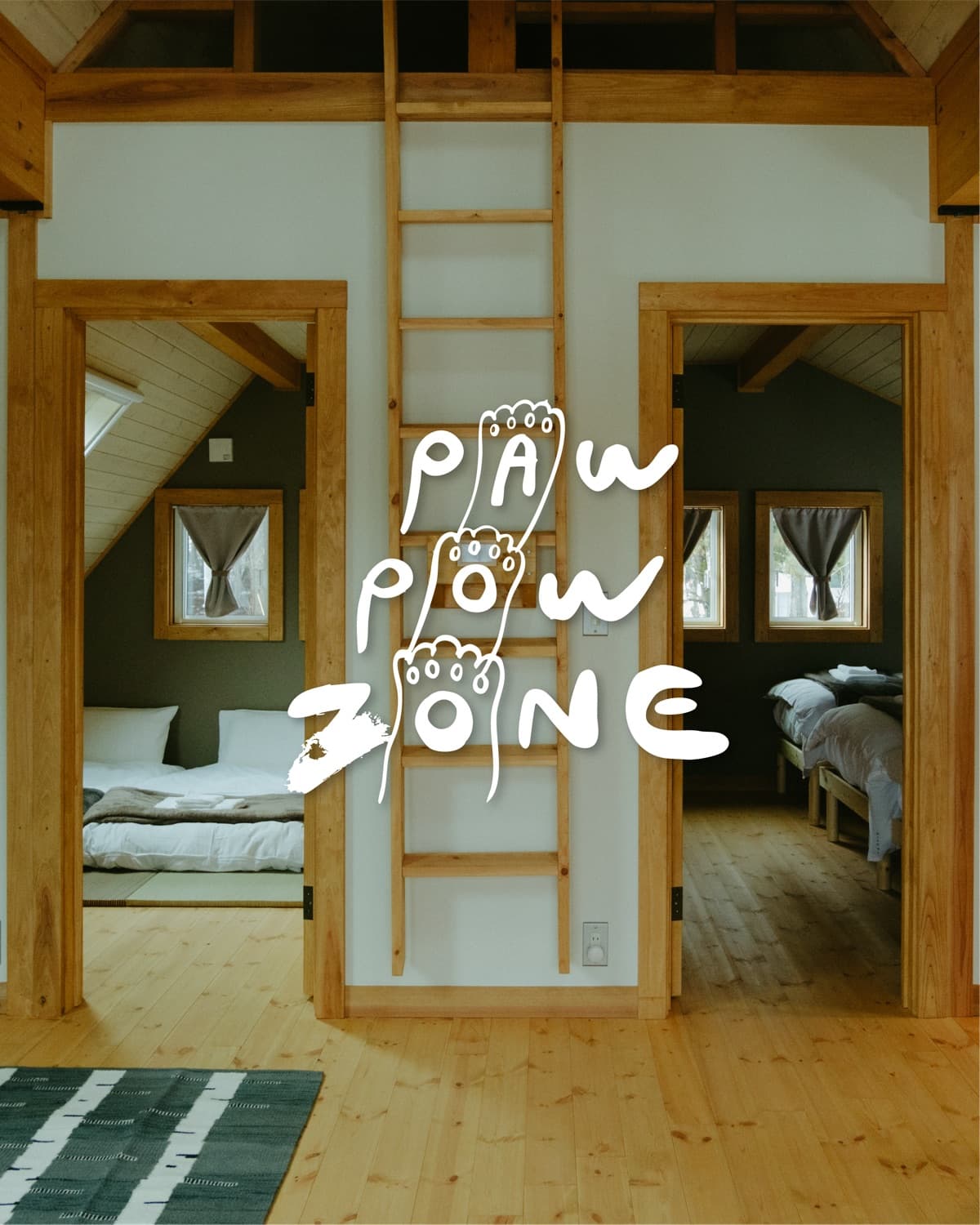 Loft living space at PAW POW ZONE with warm wood interior and mountain-chalet atmosphere