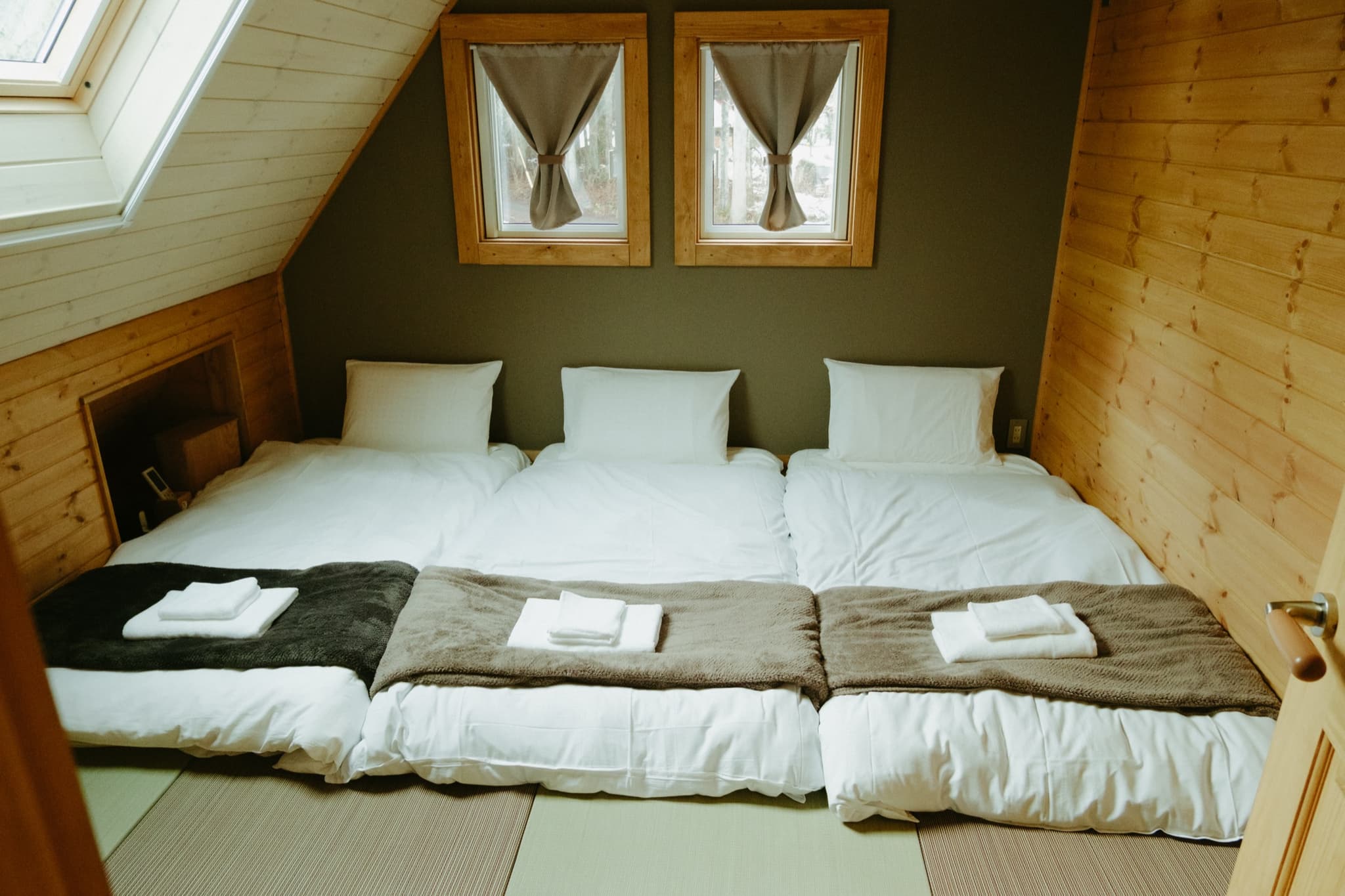 Japanese Tatami Room — A tatami room suited for flexible sleeping arrangements for families or groups.
